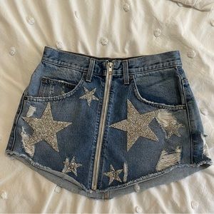 Mini denim skirt from Carmar with silver stars